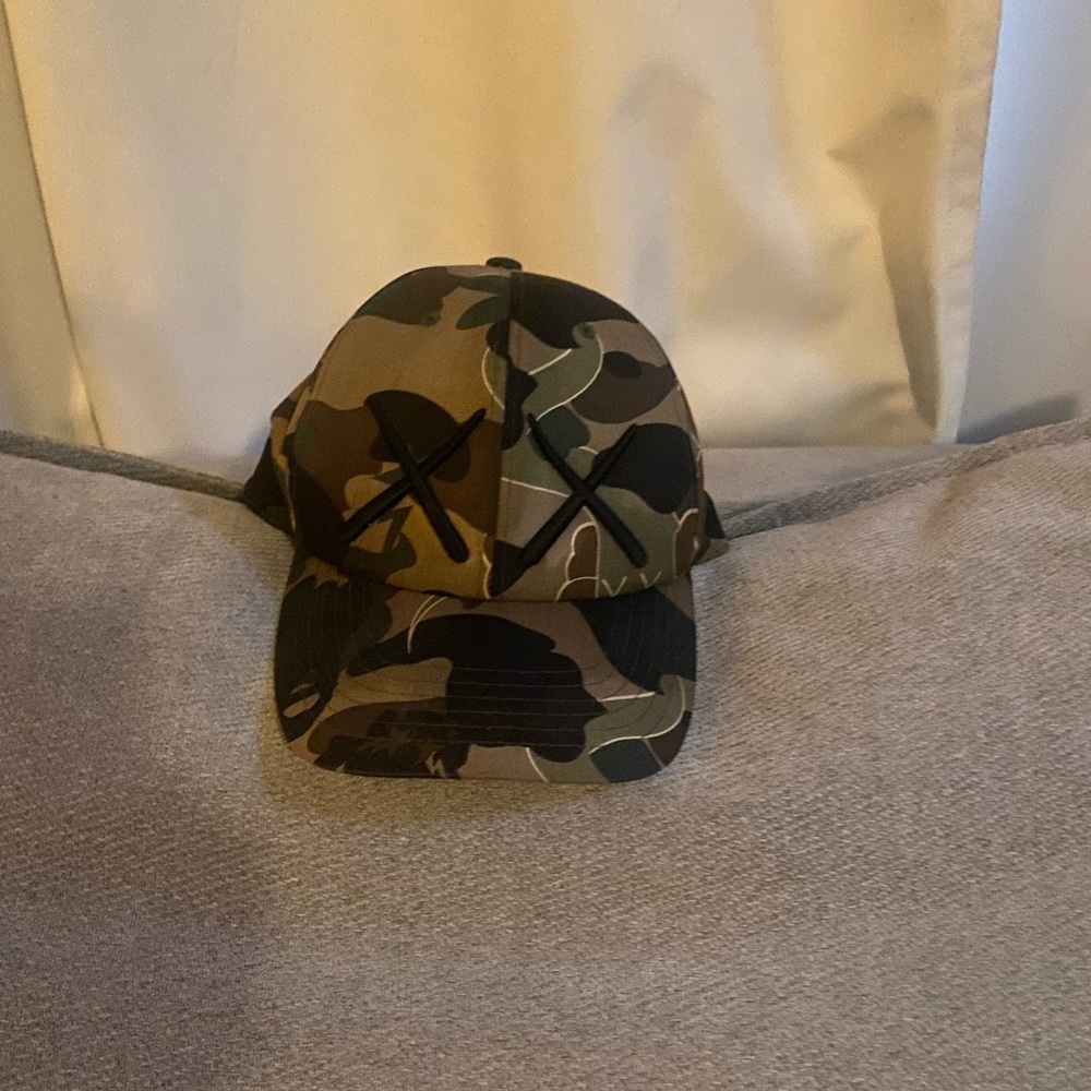 Kaws X Bape hat.